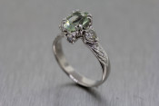 platinum green stone engagement ring